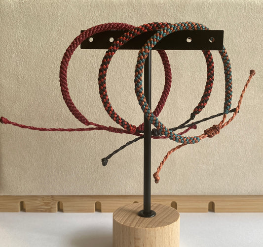 Hand braided nylon cord adjustable bracelet.