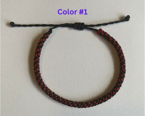Hand braided nylon cord adjustable bracelet.