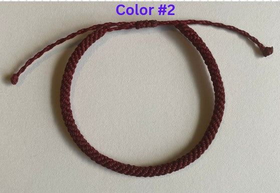 Hand braided nylon cord adjustable bracelet.