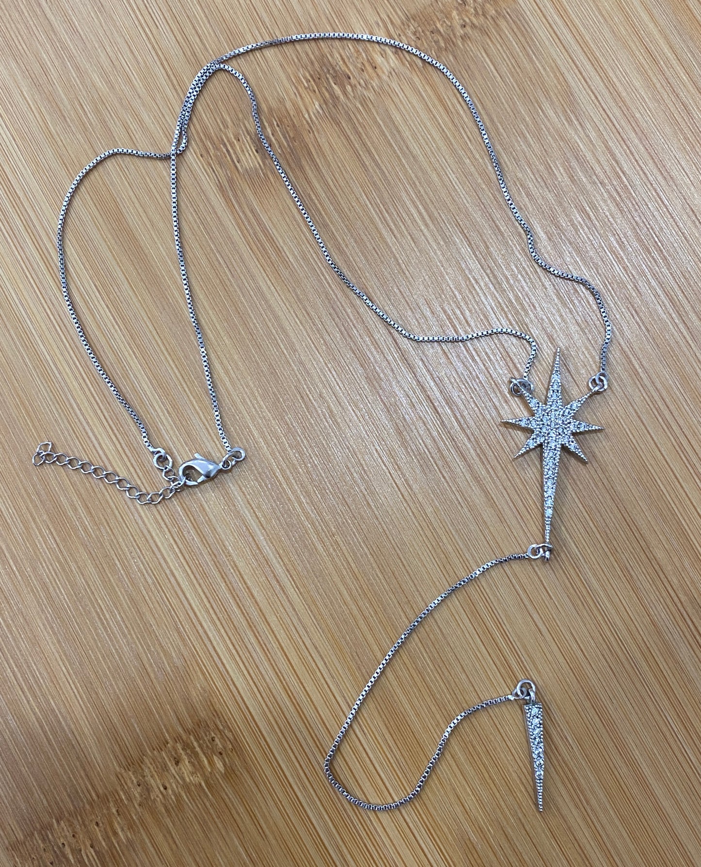 16" Rhodium Star Pendant Necklace with CZ Accents & Dangling Spike. Dainty Celestial Necklace.